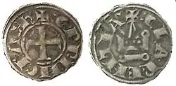 Two sides of a small coin, one of them depicting a cross