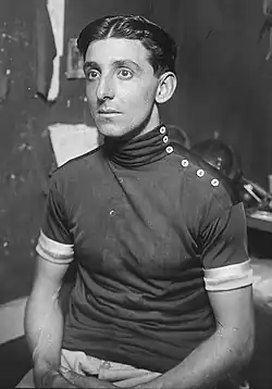 Seated man in cycling uniform