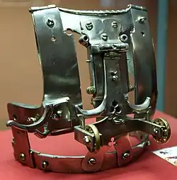 HJRK B 21 - Mechanical breastpiece used for Bundrennen, a tournament type which was probably only organized in the Imperial Court, c. 1490. Only three mechanical breastplates remain (one in Paris, two in Vienna). The breastplate was designed to carry a shield that, when hit properly, will be ejected over the jouster's head and burst apart, releasing triangle tin segments.[15][16]