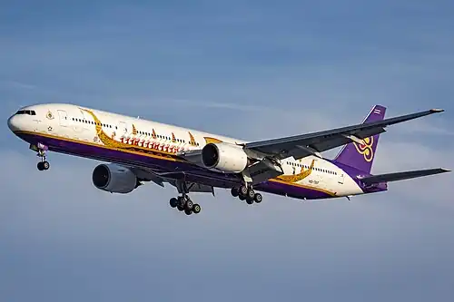 Boeing 777-3D7 (HS-TKF) in the Royal Barge Suphannahong livery