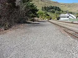 Looking along the Heathcote station platform in the direction of the Lyttelton rail tunnel.