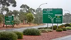 Signs at the junction of the three highways
