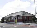 The station ticket office, viewed from the road.