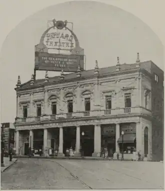 A black and white photograph of a building