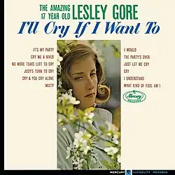 Words explicating the artist, title, and track listing against a white background surround a narrow photo of a young woman looking sorrowful with out-of-focus tree flowers in the foreground.
