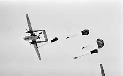 Israeli paratroopers are jumping from a Nord Noratlas in 1972