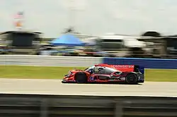 The No. 04 car entered by CrowdStrike Racing at the 2024 12 Hours of Sebring