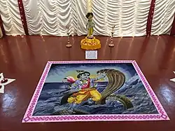 Art of Lord Krishna at a Holi function.