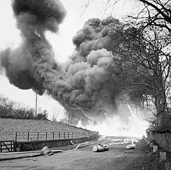 A hedge hopper demonstration staged by the Petroleum Warfare Department at Mid Calder in Scotland, 28 November 1940