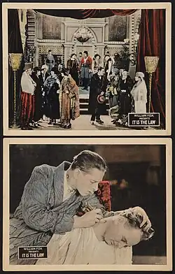 Two lobby cards—above, a crowd of people in a richly decorated room; below, a man tattooing another man's neck to match his—each captioned 'William Fox presents It Is the Law