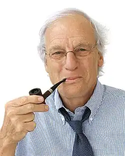 Portrait of Knauss smoking a pipe