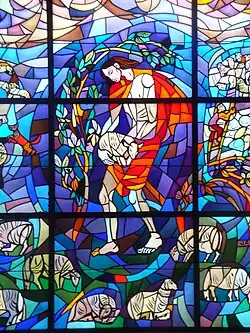Stained glass depicting the parable of the lost sheep (side nave)