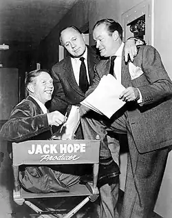 Hope (right) with his brother Jack (seated), who produced his early 1950s show, with comedian Jack Benny