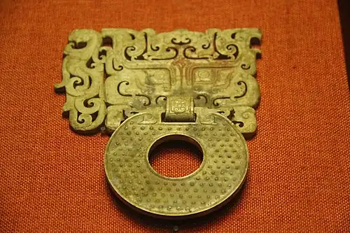 Mascaron on an ornamental handle of a bi disc, c.100 BC, jade, Museum of the Mausoleum of the Nanyue King, Guangzhou, Guangdong, China