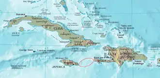 A map of the Northern Caribbean, with Jamaica and Hispaniola located below Cuba and other small islands. The water between the eastern coast of Jamaica and the western tip of Haiti is circled in red to show the location of the Jamaica channel.