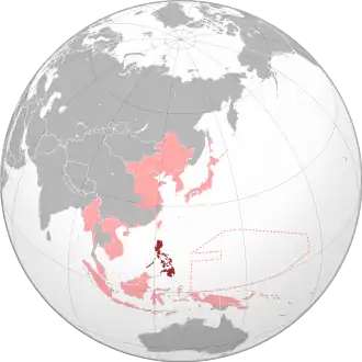 The former American-occupied Philippines (dark red) within the Empire of Japan (light red) at its furthest extent