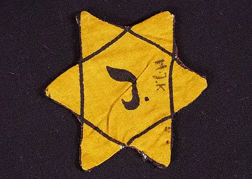 Image 17 Yellow badge Photograph credit: Ronald Torfs Yellow badges are badges that Jews were ordered to wear in public during periods of the Middle Ages by the ruling Christians and Muslims, and in Nazi Germany in the 1940s. The badges served to mark the wearer as a religious or ethnic outsider, and often served as a badge of shame. The badge pictured is in the collection of the Kazerne Dossin Memorial, Museum and Documentation Centre in Mechelen, Belgium. More featured pictures