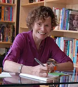 Judy Blume signing a book