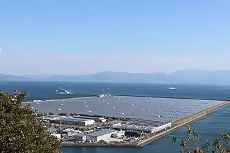 A view of industrial buildings on the coast