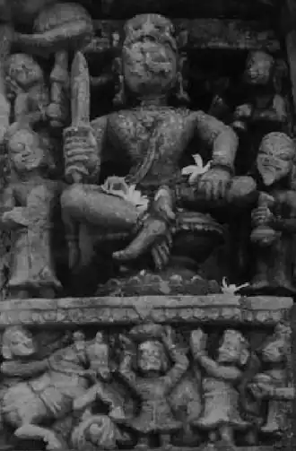 Kapilendra Deva Routray depicted holding a sword and seated in a dominating Lakulisha position at Kapileswar Temple in Old Bhubaneswar