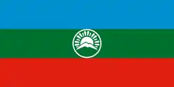 Alternative flag of Karachay-Cherkessia with a simplified central emblem.