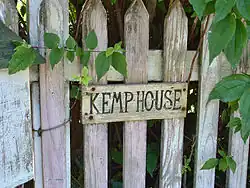 After a century and a half the name officially changed from Kemp House to Mission House, but an early sign remains, deteriorating in the weather