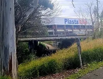 The cycleway heading below Cumberland Highway (Kenyons Bridge) and over Prospect Creek (looking from Kaluna Reserve, Smithfield)