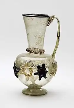 11th or 12th-century jug, blown, trail-decorated and tooled, 18.2&nbsp;cm tall