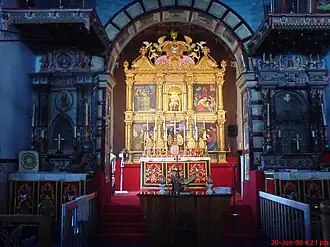 Altar of the St Mary's Church in Kottayam flanked by two St Thomas crosses from the 7th century AD on either side. The crosses pre-date the church which was built in 1550 AD.