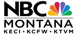 The letters NBC and the NBC peacock, a six-colored, six-feathered stylized bird, above a thin black line and the word MONTANA below the line. On a third line are the call letters: K E C I, K C F W, and K T V M.