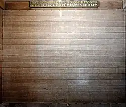 One wall listing the names of the 3,000 German students killed during the First Battle of Ypres, inside the entrance block.