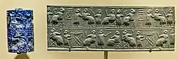 Lapis lazuli cylinder seal recovered from tomb PG 800, inscription U-bara-ge[23]