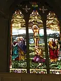 Left semitransept window: The Crucifixion