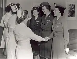 Laura Cobb, standing, far right