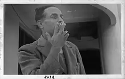 A photo of Devkota smoking (2013 BS (1956-1957))