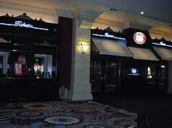 Interior entrance with neon "Crazy Horse Paris" signage