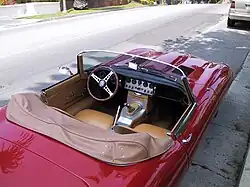 Jaguar E-type 1963, with vinyl foldable tonneau installed and snap-secured