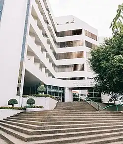 Maha Thirarachanusorn Building (1983), designed by Vira Buranakan, houses the Chulalongkorn University Office of Academic Resources, often known as the Chulalongkorn University Library: Chula Library.