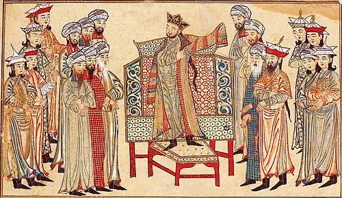 Sultan Mahmud of Ghazni receiving a richly decorated robe of honor from the caliph al-Qadir in 1000. Miniature from the Rashid al-Din's Jami' al-tawarikh
