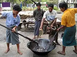 The traditional way of making special glutinous rice htamanè is still practiced
