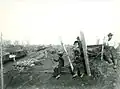 Men sit near the Manassas Junction railroad in 1862