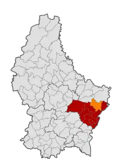 Map of Luxembourg with Manternach highlighted in orange, and the canton in dark red