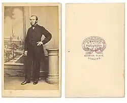 Historical photo of a man standing