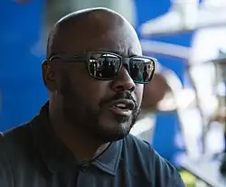 Faulk wearing sunglasses