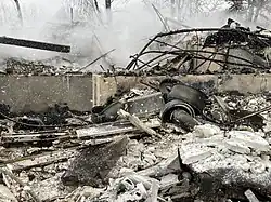 Pots and pans seen in the remains of a home burned from the fire the night after.