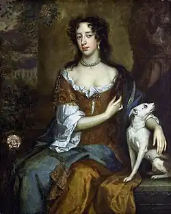 An informal portrait of Mary. She has a long handsome face, dark eyes and black hair. Her hair, her brown satin dress and plain linen undergarment are in fashionable disarray. She clasps a white dog.