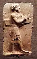 assyrian horizontal harpist