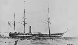 A grainy, black and white photo depicting the side of Mississippi. She has three masts, a short hull, and a large paddlewheel situated amidship.