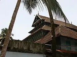 Mishkal Mosque in Kozhikode is a classic example of Kerala's native mosque style with gabled roofs, sloped wooden window panels, and without minarets.