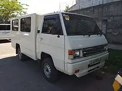 A Mitsubishi L300 multicab